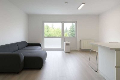 Moderne 1-Zimmer-Wohnung mit Einbauküche im 1. OG – Wohnpark Am Kuschelhain