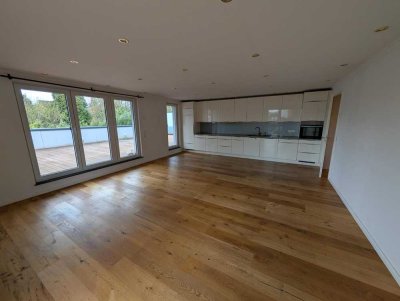 Exklusive 4-Zimmer Neubauwohnung mit großer Sonnenterrasse und Tiefgarage