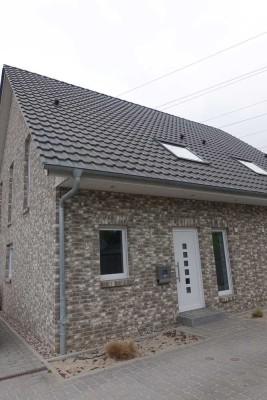 Strandnah gelegene Doppelhaushälfte mit Garten in Scharbeutz