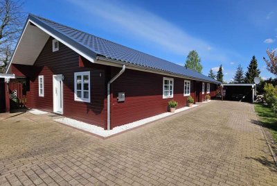Wohnen mit nordischem Urlaubsflair! Familienfreundliches dänisches Blockhaus mit Einliegerwohnung.