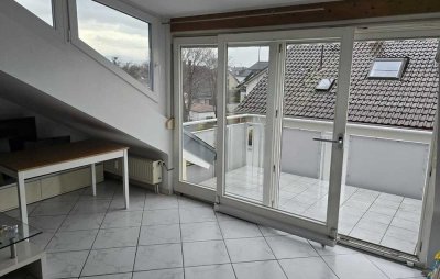 Helle 2-Zimmer Dachgeschosswohnung mit Balkon in Sandweier