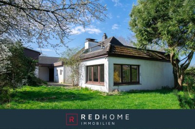 Wohnen mit Weitblick – Einfamilienhaus mit Dachterrasse und großem Grundstück