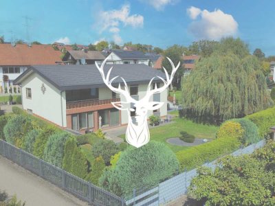 Elegantes Zweifamilienhaus mit einem einzigartigen Gartengrundstück und Baufenster in Berau