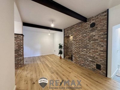Erstbezug: Stilvolle 3-Zimmer-Wohnung mit Garten und und exklusiver Ausstattung