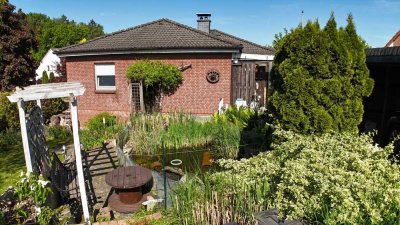 Bungalow mit Vollkeller, Specksteinofen, Carport und Klimaanlage - Verkehrsberuhigtes Wohngebiet