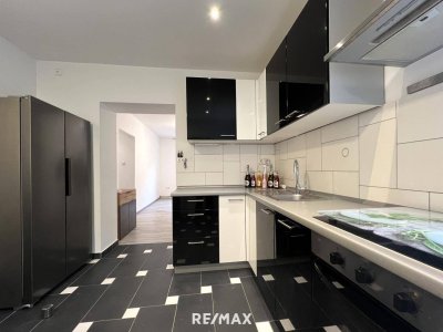 Moderne, sanierte 3-Zimmer-Eigentumswohnung mit Gartenanteil und Garage