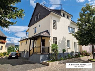 Nähe Montabaur! Ein-/ Zweifamilienhaus mit schönem Gartengrundstück und 3 Garagen in Oberelbert!