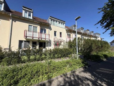 Vermietete 2-Zimmer-Erdgeschosswohnung mit TG-Stellplatz, Terrasse & Gartenanteil in Neureut