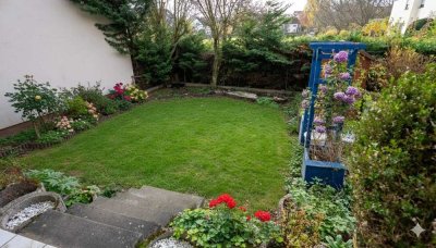 Frankfurts grüner Familientraum: 3-Zimmer-Gartenwohnung mit eigenem Garten & Garage | 91 m²