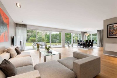 Hochklassige 5-Zimmer-Wohnung mit Südgarten, Sauna und Hobbybereich in ruhiger Toplage