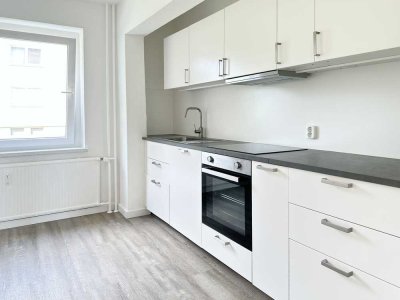 Hochwertig sanierte 3-Zi.-Whg. mit Einbauküche und PKW-Stellplatz