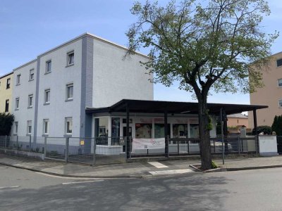6-Parteien Wohnhaus+Gewerbefläche(Laden)+2 Garagen