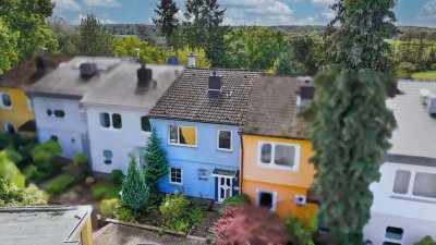 Ihr neues Familienparadies wartet – Reihenmittelhaus mit riesigem Potenzial in Hanau!