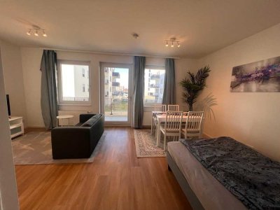 Schön möblierte Wohnung in Neubau von 2020 mit Balkon & Top-Anbindung zum Flughafen