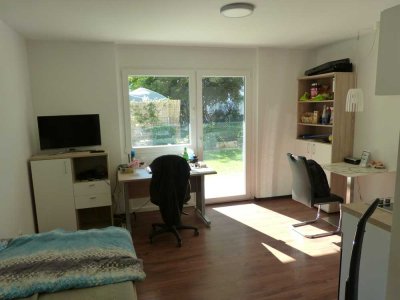 Möbliertes Apartment mit EBK und Terrasse in zentrumsnaher Lage