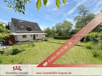 Trier-West: Solides Haus mit Traumgarten und großem Keller