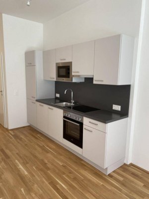 Neubau Gartenwohnung inkl hochwertiger Markenküche, Außenfläche und Kellerabteil / K2-01