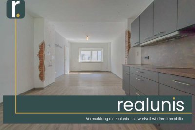 Reihenmittelhaus mit Garten – einziehen, wohlfühlen, eigene Akzente setzen. Nur bei realunis