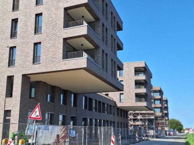 zentrumsnah und Wasserblick -1-Zimmer-Wohnung mit Balkon im Erstbezug