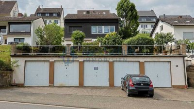 vermietetes MFH mit 3 Wohnungen und 5 Garagen in Trechtingshausen (WEG geteilt)