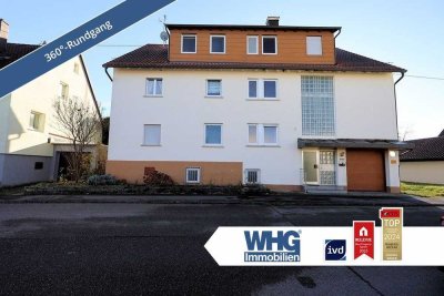 Dreifamilienhaus mit Garagen und großem Grundstück zur Bebauung
