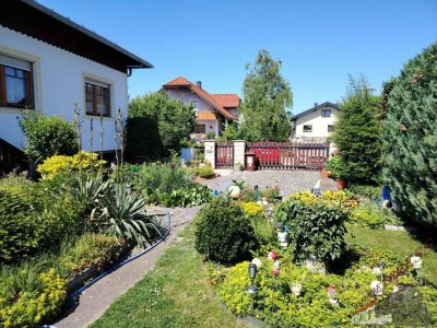 Einfamilienhaus in versteckter, ruhiger Siedlungslage (Sackgasse) mit schönem Garten wartet auf nette Familie!