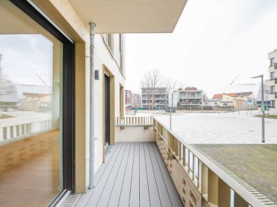 ERSTBEZUG: Moderne 2-Zi.-Wohnung mit stilvoller Einbauküche, privater Terrasse & großzügigem Wohnamb
