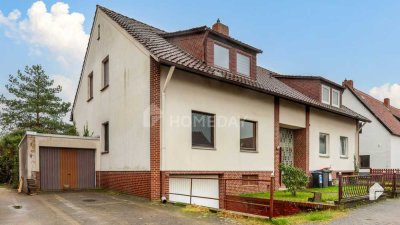 Wohnen und Vermieten: 4-Familienhaus mit 3 bezugsfreien Wohnungen, Garten, 2 Terrassen & 4 Garagen