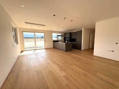 Sofortbezug! Neuwertige Dachgeschosswohnung mit sonniger Süd-Terrasse in Mils