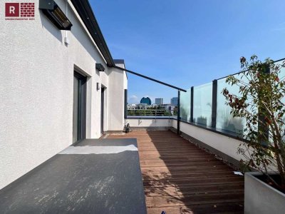 Urbaner Luxus trifft Ruhe – Vollmöbliertes 2-Zi-Penthouse mit Dachterrasse & TG
