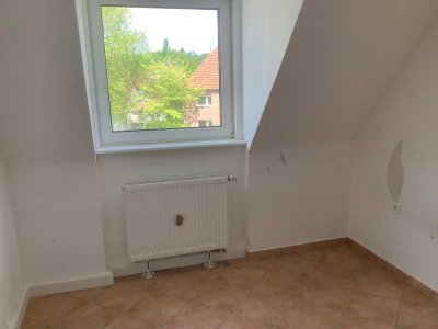 Schöne 4-Zimmer-Dachgeschosswohnung mit Balkon!