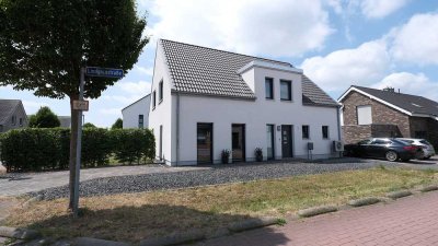 Neuwertig und luxuriös: Einfamilienhaus mit Garage in kinderfreundlicher Lage.
