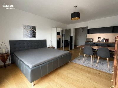 Stilvolles Apartment mit Spa, Balkon &amp; Tiefgaragenplatz – nur 10 Gehminuten vom Neusiedler See entfernt!