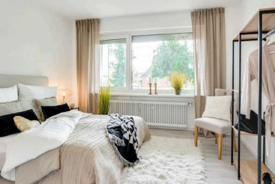 Helle 3-Zi Erdgeschosswohnung mit Balkon in ruhiger Lage