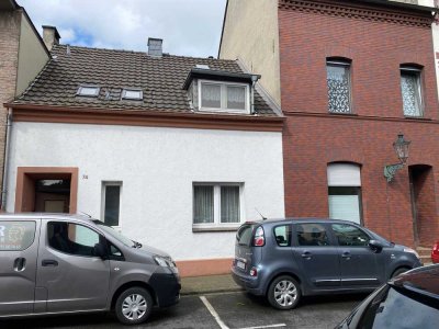 Heerdt wohnen und vermieten direkt am Rhein Einfamilien- und Appartementhaus in schöner Wohnlage