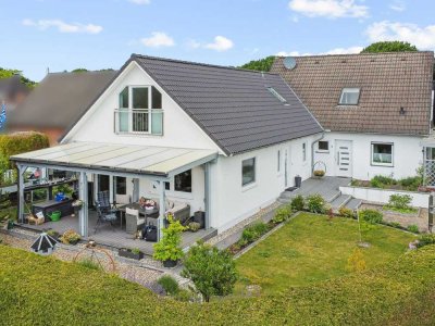 Vielseitiges Haus mit zwei separaten Wohneinheiten in familienfreundlicher Lage von Kaltenkirchen