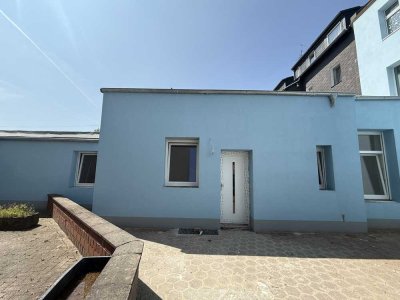 Erstbezug nach Sanierung 1,5-Zimmer-EG-Wohnung mit privatem Innenhof