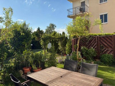 Abendsonne und Garten: Terrassenwohnung mit KFZ-Stellplatz