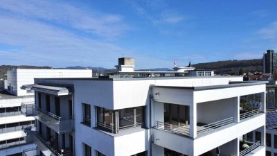 Exklusive 4.5 Zimmer City-Wohnung an Top-Lage mit Lift, hochwertiger EBK und zwei TG-Plätzen
