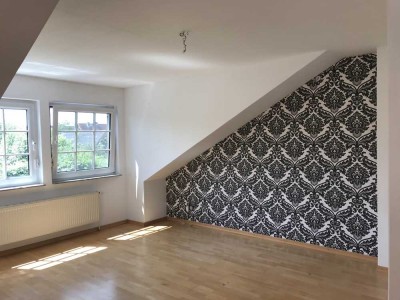 Schöne, helle  2-Zimmer-Dachgeschosswohnung mit EBK in Wankendorf
