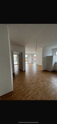 Lichtdurchflutete Neubauwohnung mit großer Dachterasse und TG-Stellplatz