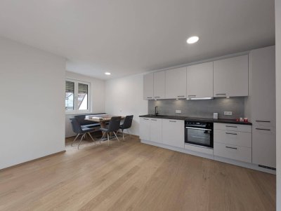 Erstbezug: Helle 3-Zimmer-Wohnung mit großzügigem Garten