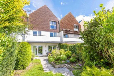 Split-Level-Reihenmittelhaus mit sonnigem Süd-West-Garten und ruhiger Lage in Unterschleißheim!