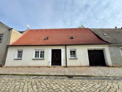 Platz für die ganze Familie – Reihenmittelhaus mit Garten, Wintergarten & 7 Zimmern in Roßlau