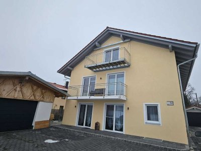 Attraktive Neubau Erdgeschoss Wohnung mit Gartenanteil und Garage