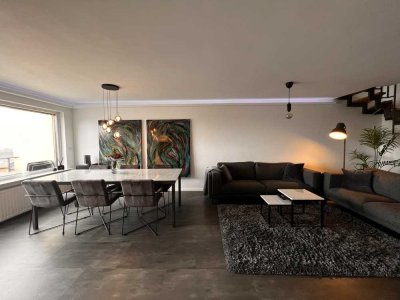 Außergewöhnliches Juwel mit atemberaubendem Blick:  Maisonette-Wohnung mit Panoramablick