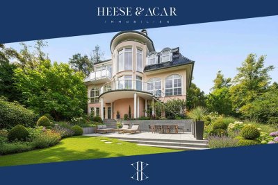 Exklusive Villa in Bestlage mit direktem Zugang zum See auf einem ca. 2.000 m² großen Hanggrundstück