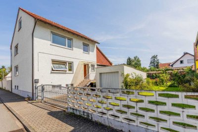 Freistehendes Einfamilienhaus mit kleiner ausbaufähiger Scheune und kleinem Garten in Büttelborn
