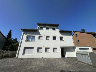 Designerwohnung mit Garten und zwei Garagen