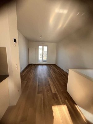 Wunderschöne 2 - Zimmer Maisonettewohnung im Neubau